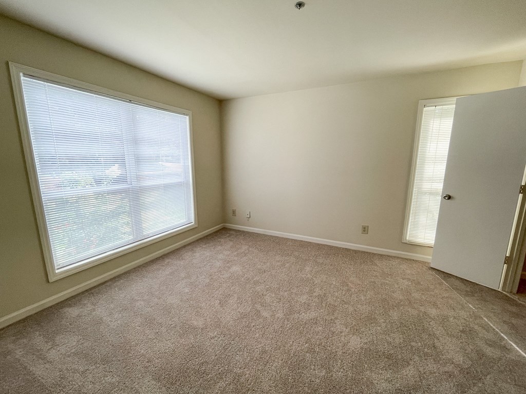 Drayton main bedroom with large windows located in Duluth, GA