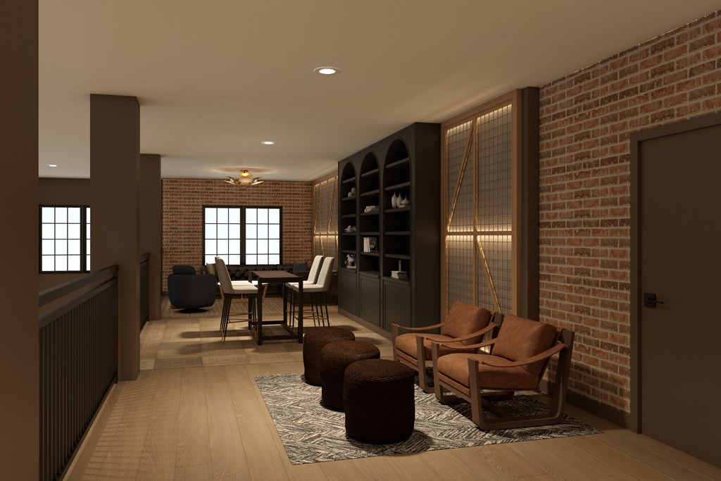 A living room with a brick wall and wooden furniture.