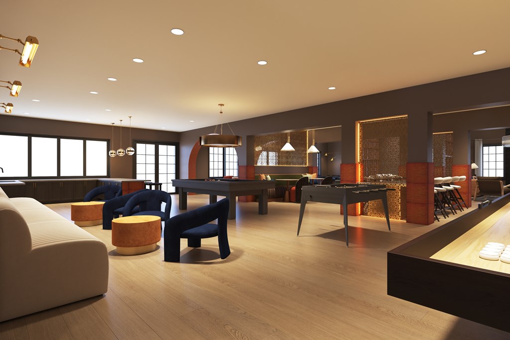 A modern living room with a pool table and a bar area.