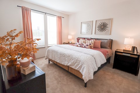 a bedroom with a bed and two windows at The Crest at Acworth, Georgia, 30102