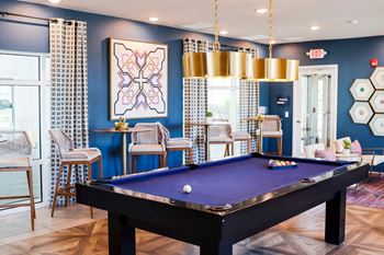 play a game of pool in our games room