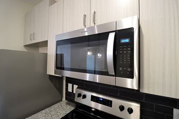 a stainless steel microwave oven in a kitchen at The Crest at Acworth, Georgia