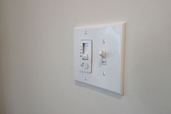 a white light switch on a white wall at The Crest at Acworth, Acworth, GA, 30102