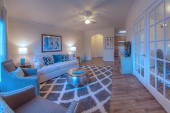 Spacious Living Room with Dining Area at The Crest at Sugarloaf, Lawrenceville, GA - Photo Gallery 9