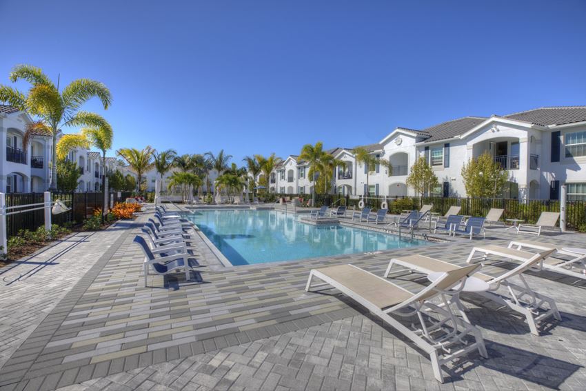 Pool Side Relaxing Area With Sundeck at The Crest at Naples, Florida, 34113 - Photo Gallery 1