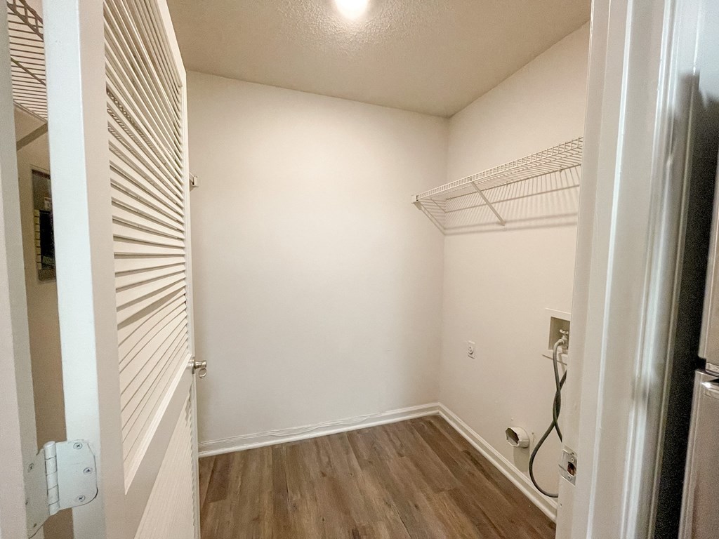 The Crest at Berkeley Lake St James laundry closet with appliance hookups located in Duluth, GA 30096
