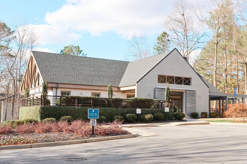 The Crest at Berkeley Lake clubhouse entrance located in Duluth, GA 30096