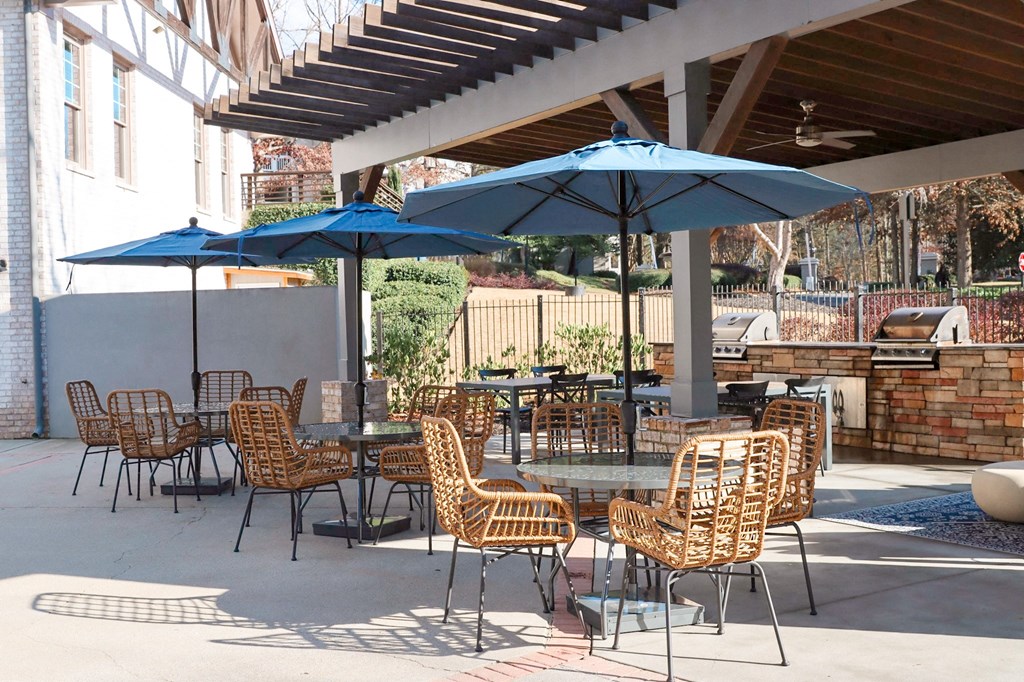 The Crest at Berkeley Lake grilling stations on the pool deck located in Duluth, GA 30096