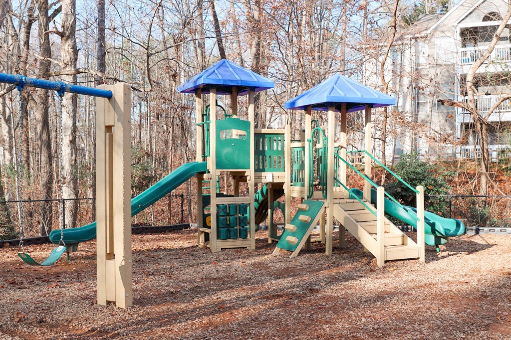 The Crest at Berkeley Lake playground with swing set located in Duluth, GA 30096