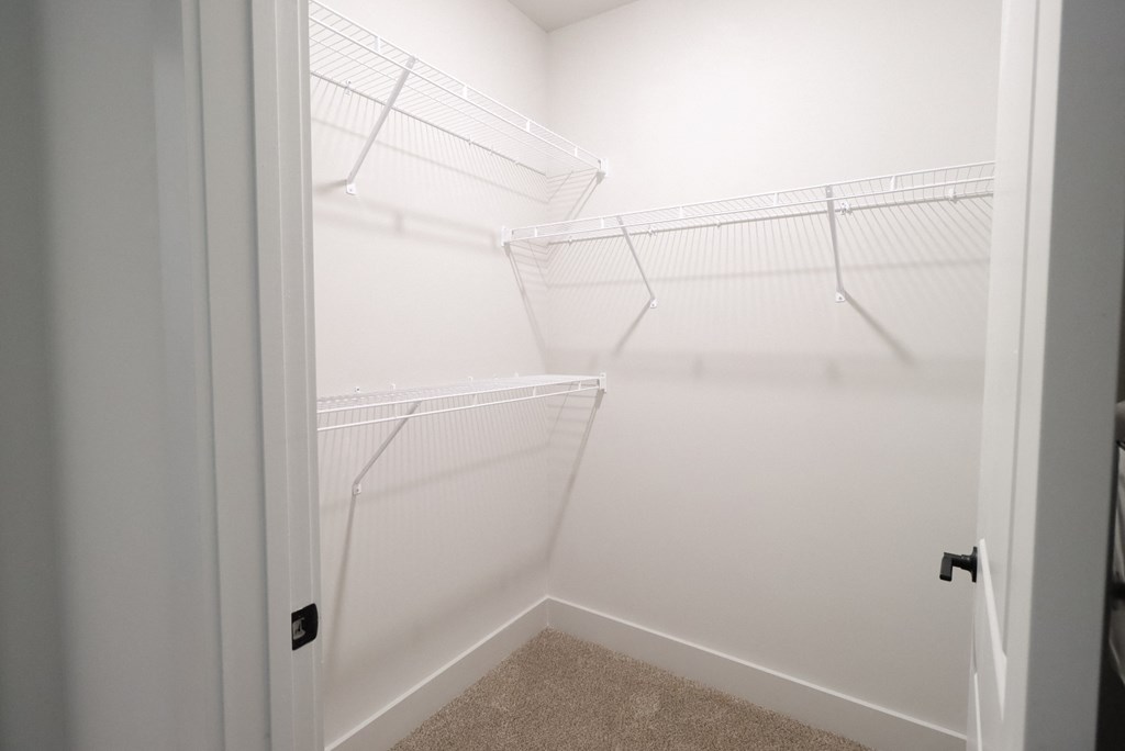Walk In Closet at The Crest at South Point Apartments, Davenport