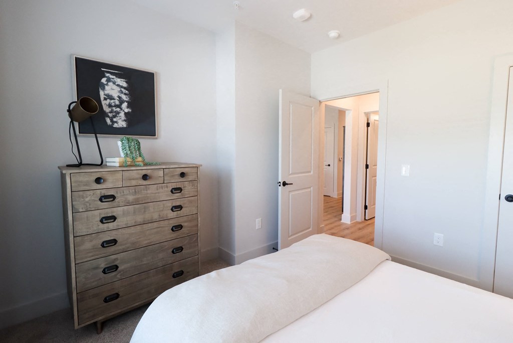 a view of a room from the top of a staircase at The Crest at South Point Apartments, Davenport , GA