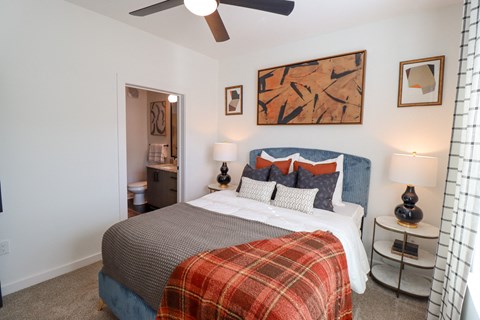 The Wren 1 bedroom model apartment home bedroom with ensuite bathroom located in Lawrenceville, GA