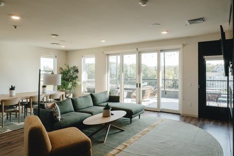 a living room with a couch and a table