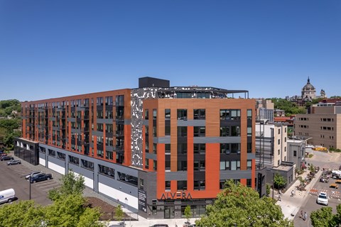 an aerial view of a large building in the city