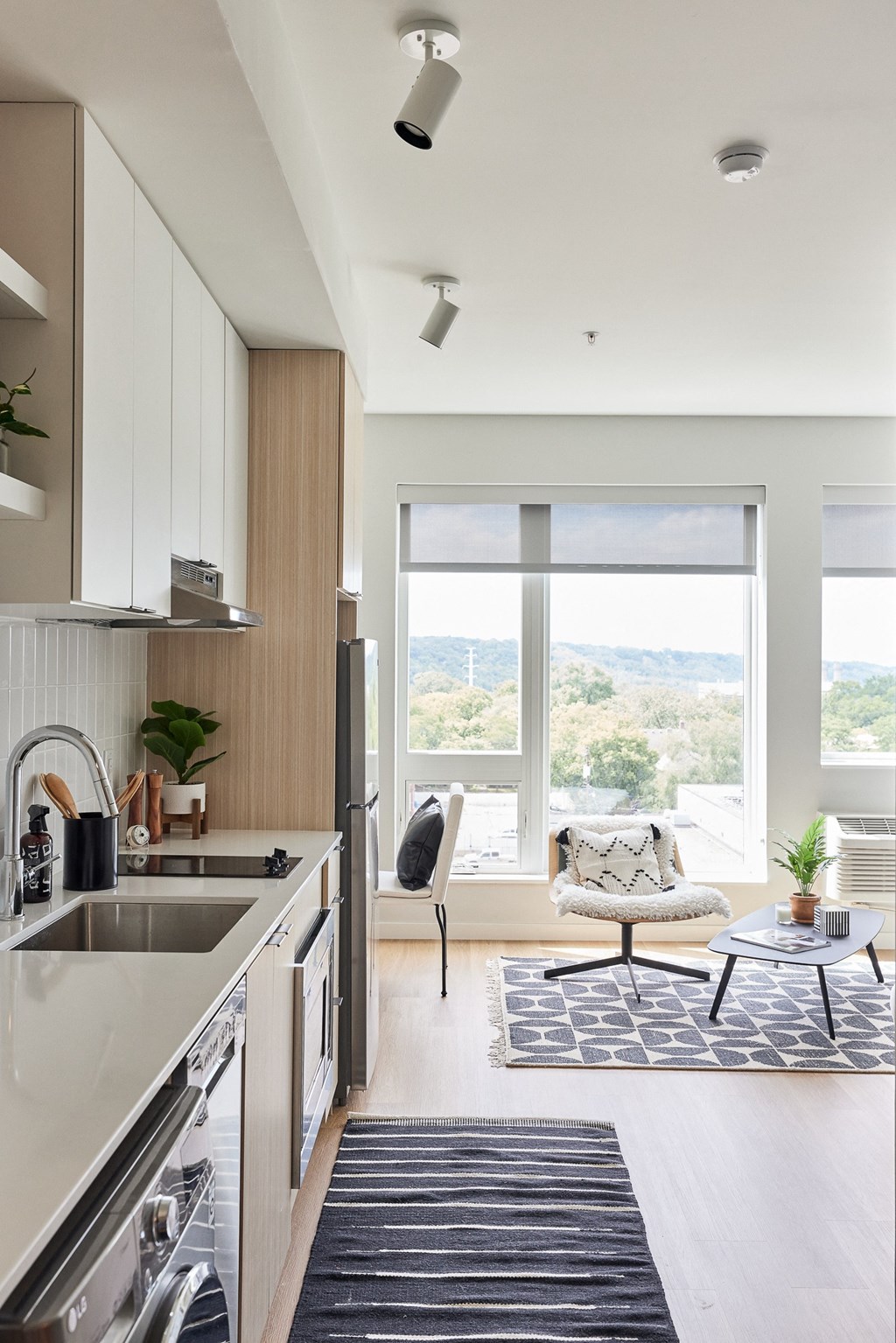 a kitchen with a sink and a window