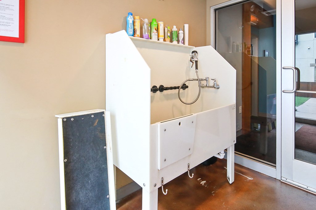 a bathroom with a sink and a shower in it
