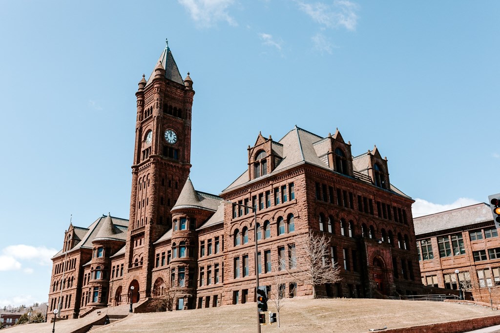 a large brick building with a clock tower