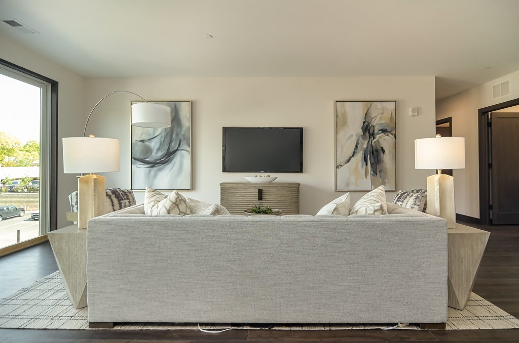 a living room with a couch and a tv