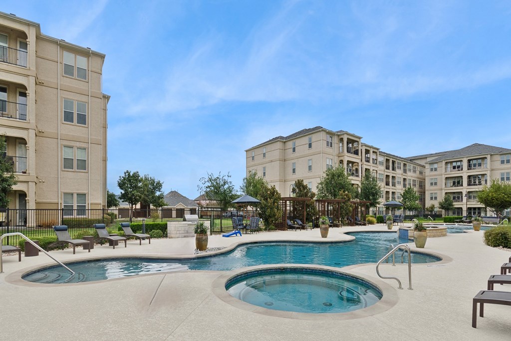 resort-inspired swimming pool and spa at Retreat at Wylie 55+ senior apartments