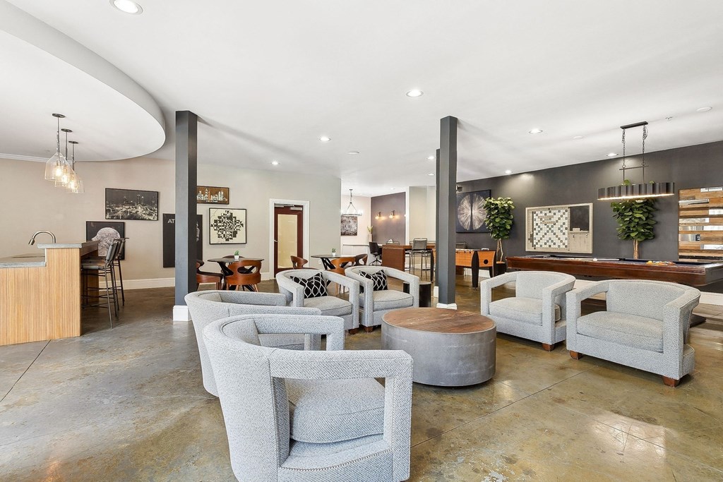 social lounge with comfortable seating and conversation areas at Sorelle apartments