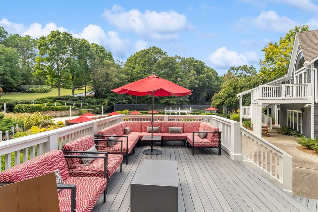 Outdoor living room with comfortable seating at The Berkshires at Vinings apartments