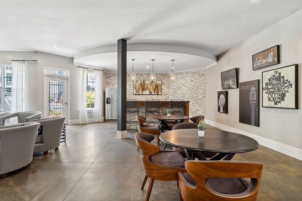 social lounge with resident kitchen and dining areas at Sorelle apartments