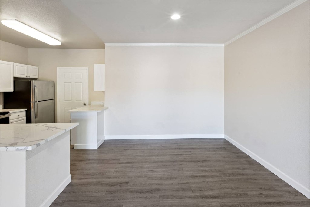 dining area with wood-inspired flooring at Bridgeport Ranch apartments