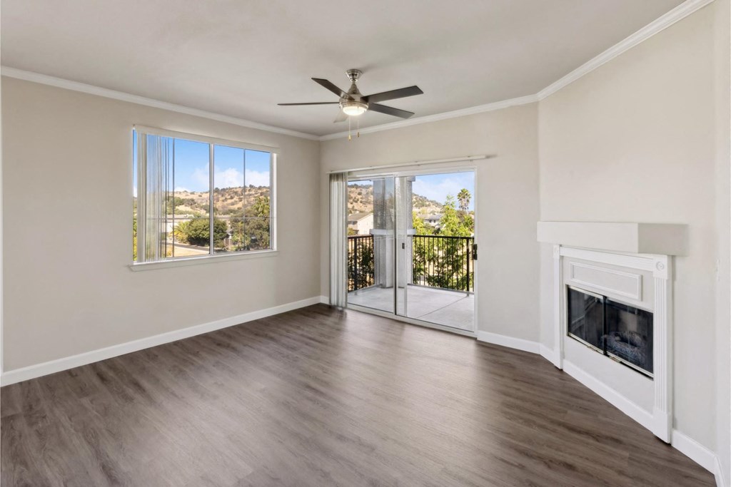 living room with a fireplace at Bridgeport Ranch apartments
