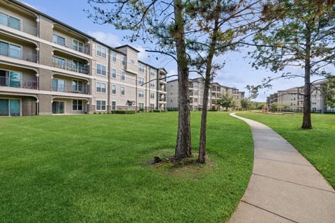 exterior view of Park at Magnolia apartments 30000 FM2978, Magnolia, TX  77354