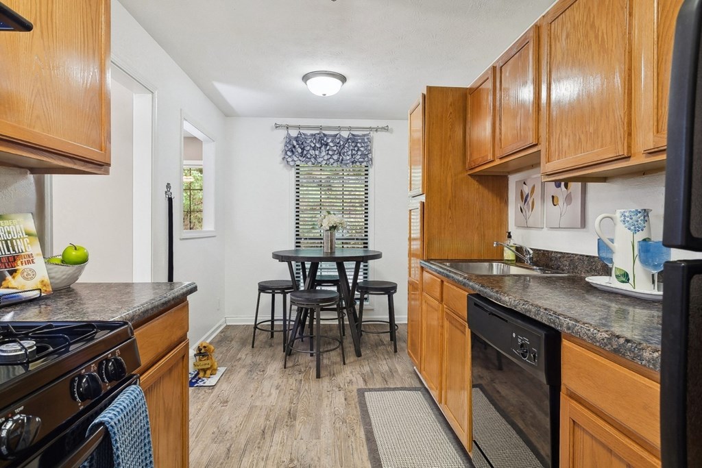 spacious kitchen with dining area at The Berkshires at Vinings apartments