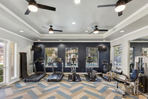 fitness center with cardio equipment at Bridgeport Ranch apartments