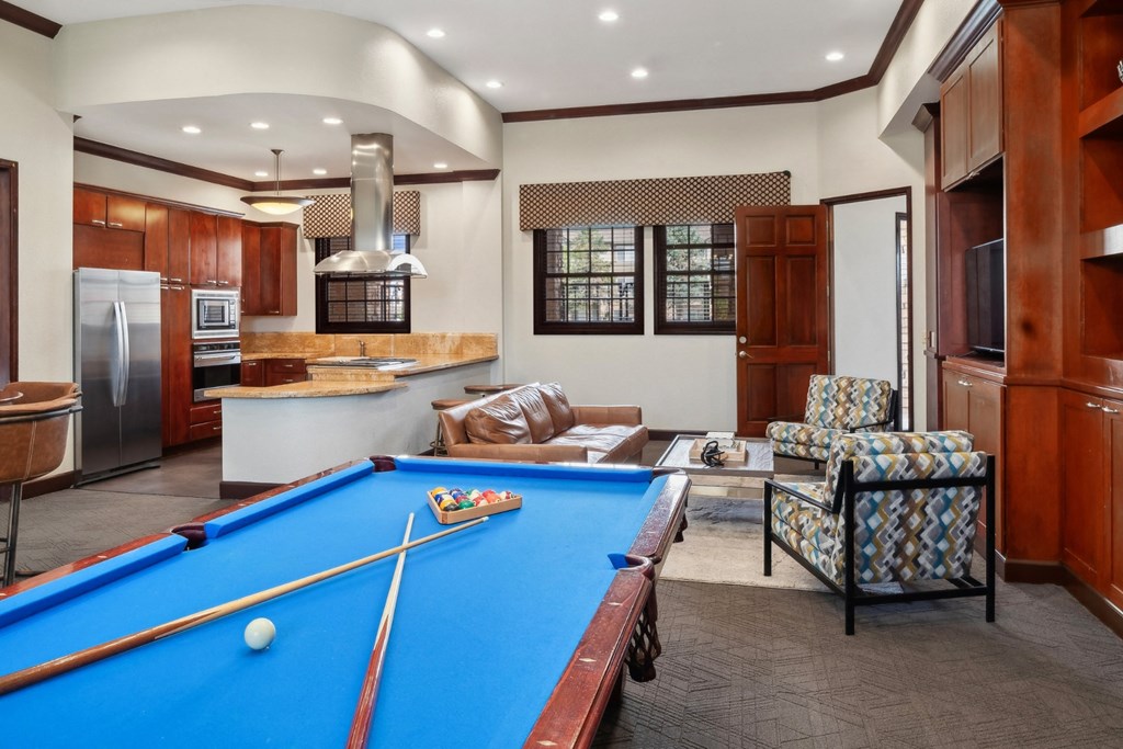 social area with billiards at Red Hawk Ranch apartments