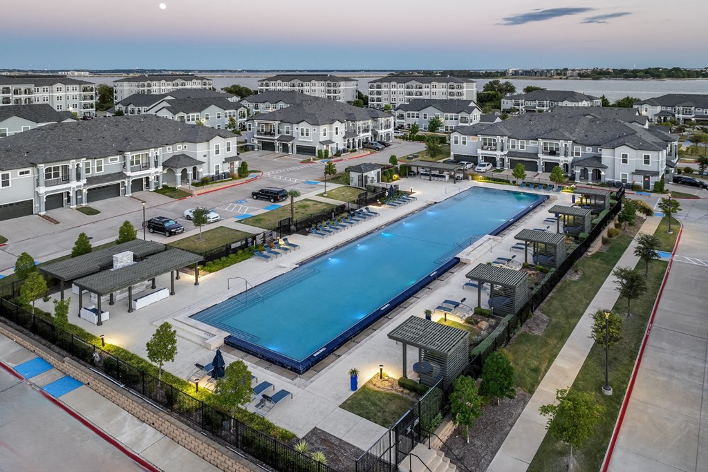 resort-inspired swimming pool at Reveal on the Lake apartments