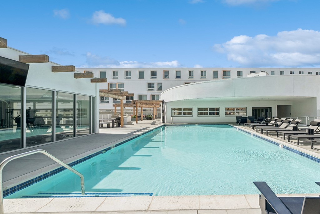 resort inspired swimming pool at One Santa Fe apartments