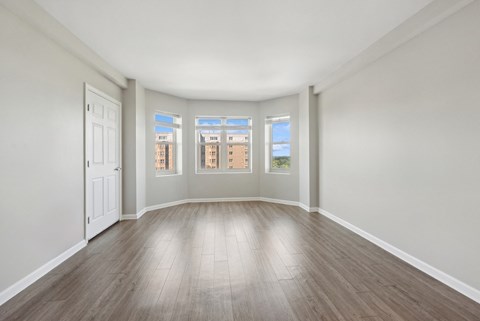 spacious living room with bay windows at HighPoint apartments