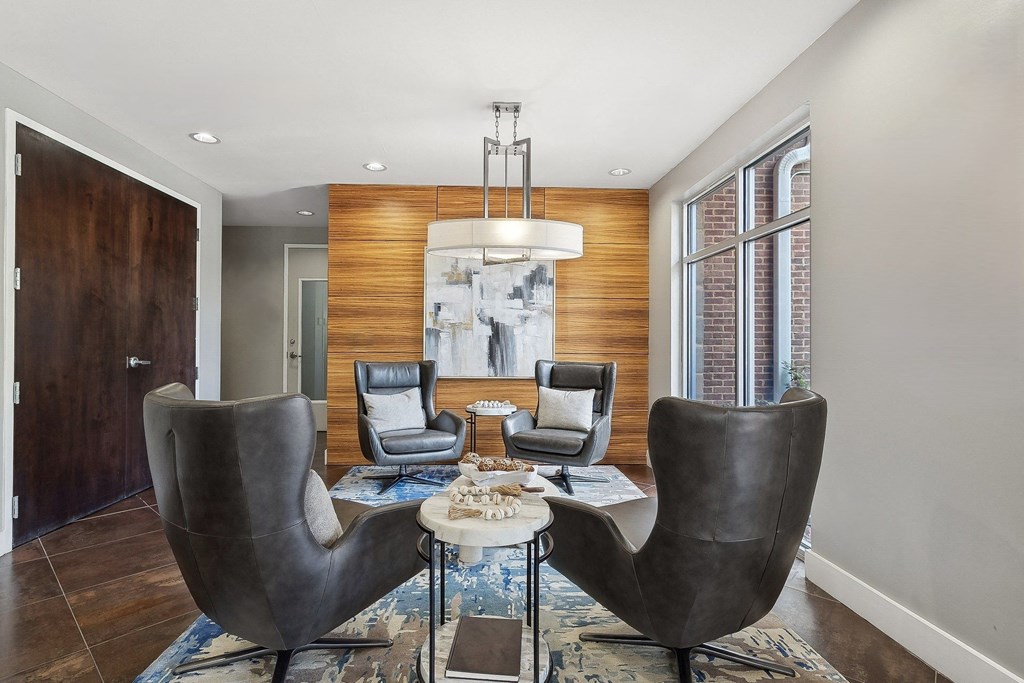 social lounge and conversation area with comfortable seating at Sorelle apartments