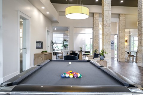 social area with billiards at The Allure apartments