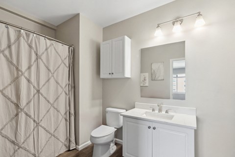 luxury bathroom with custom cabinetry at HighPoint apartments