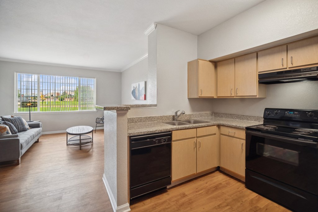 spacious open-concept kitchen and living area at Red Hawk Ranch apartments