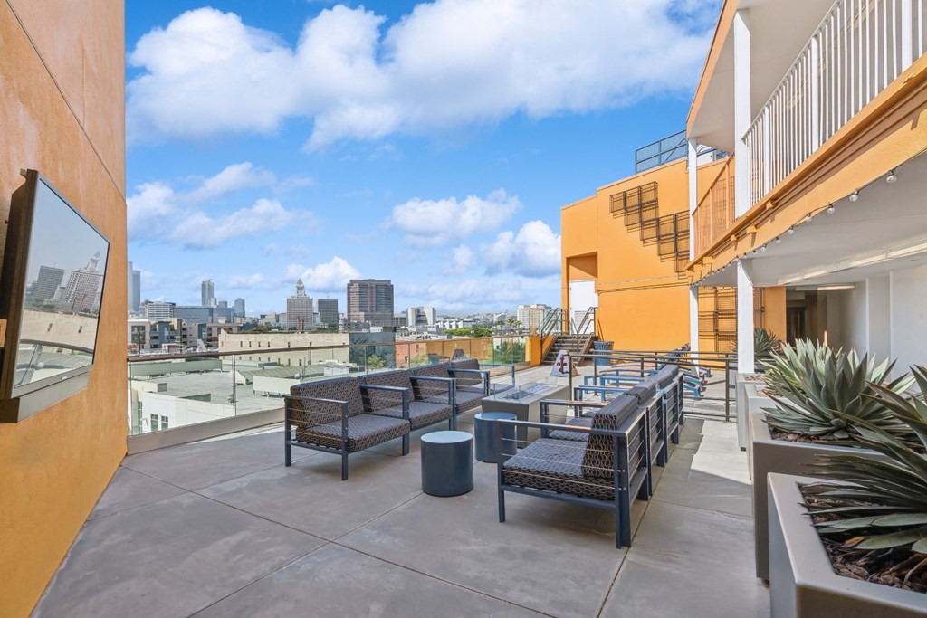 rooftop patio with comfortable seating at One Santa Fe apartments