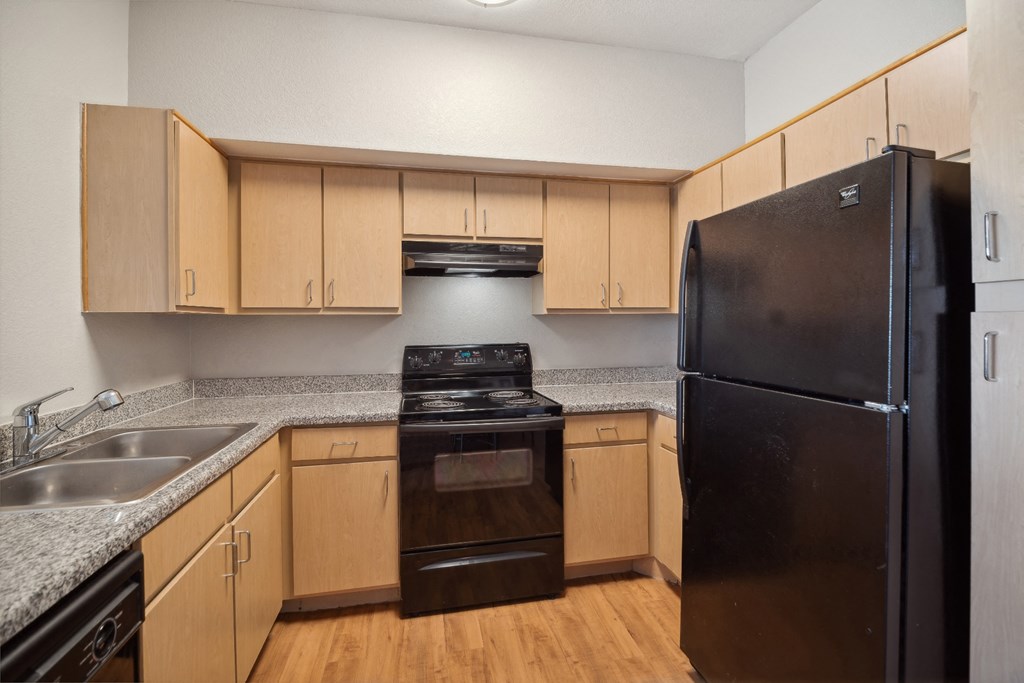 kitchen with custom cabinetry at Red Hawk Ranch luxury apartments