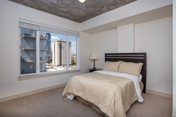 Bedroom With Expansive Windows at 2020 Lawrence, DENVER, 80205 - Photo Gallery 14