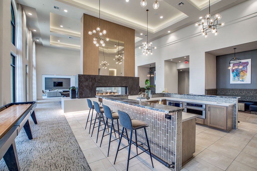 Shuffle Board and Coffee Bar in Resident Lounge at Berkshire Exchange Apartments, Spring, TX