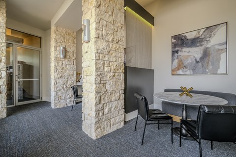 social area with conversation and work from home areas at The Allure apartments