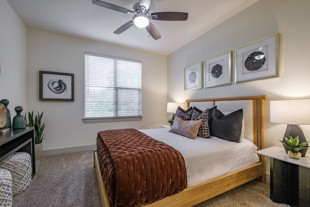 luxury bedroom with ceiling fan at Berkshire Medical District apartments