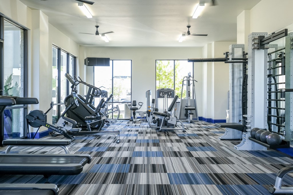 fitness center at Reveal on the Lake apartments