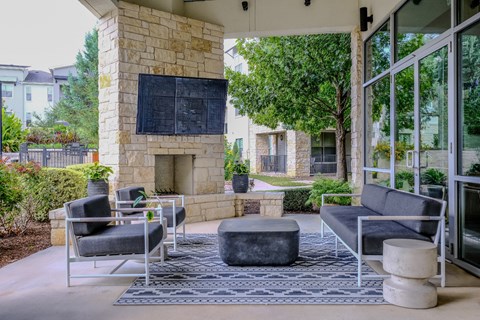 outdoor fireside lounging area at The Allure apartments