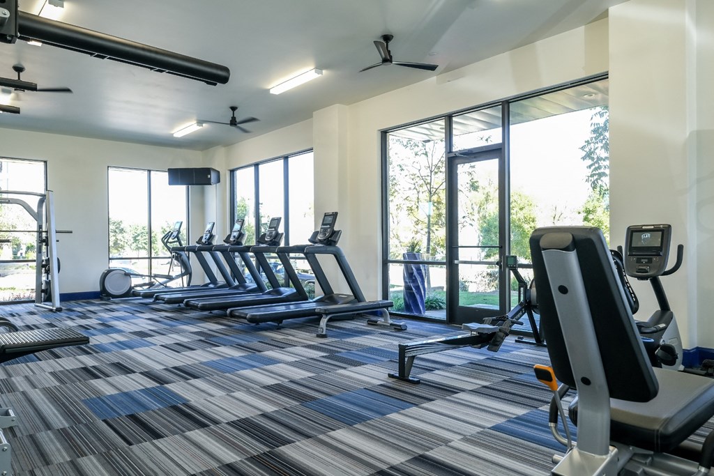 fitness center at Reveal on the Lake apartments