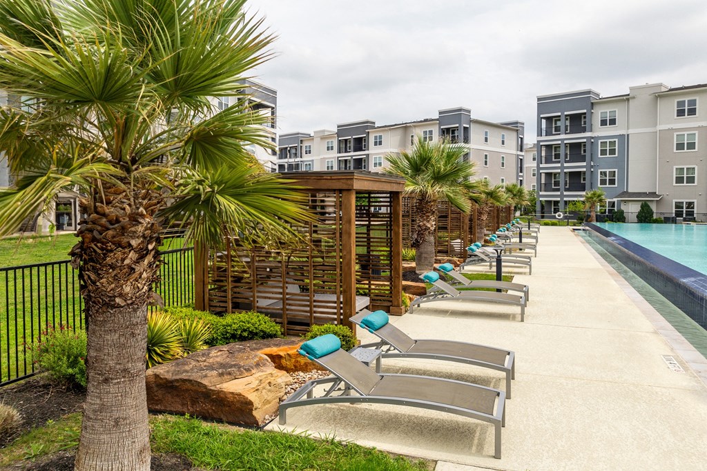 poolside tanning deck and cabanas at Berkshire Creekside apartments