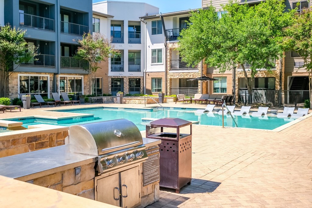 swimming pool and grilling area at Berkshire Medical District apartments